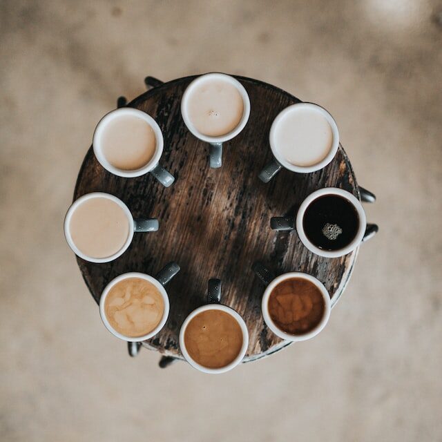 diverse coffee and cups on the table